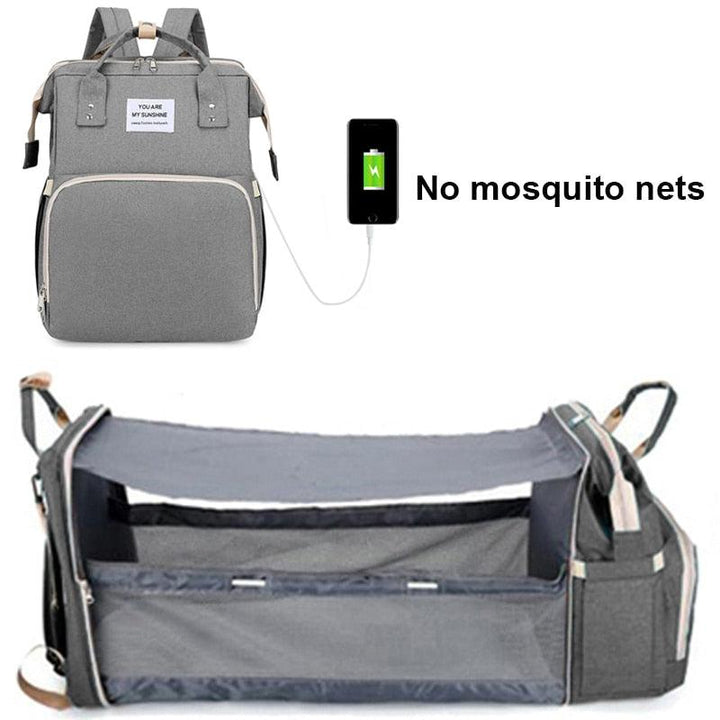 M&M 2-in-1 Backpack- Crib, Diaper Bag, Sun Shade, & USB Interface - isabellla