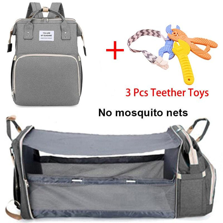 M&M 2-in-1 Backpack- Crib, Diaper Bag, Sun Shade, & USB Interface - isabellla